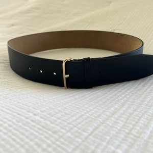 Never worn size medium black and gold belt